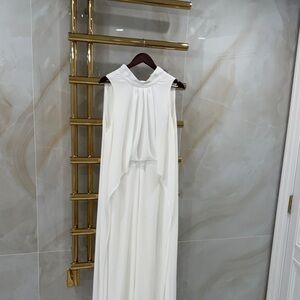 Elegant White Sleeveless Halston romper with cape